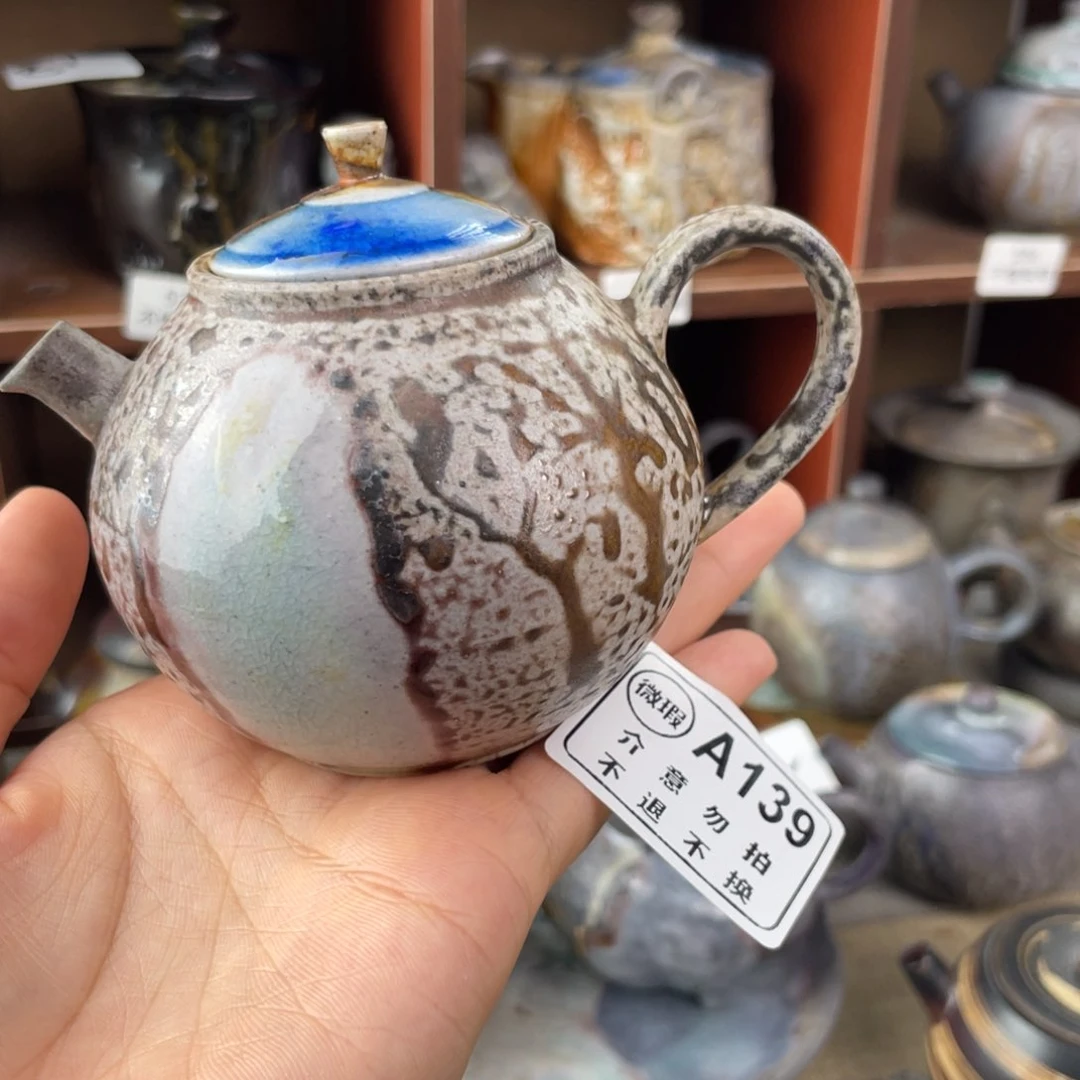 149微瑕陶泥大肚壶不退换