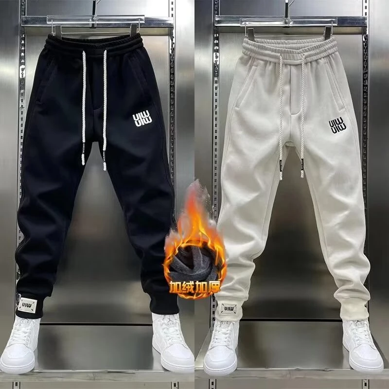 潮流男士纯色运动卫裤弹力松紧腰小脚裤简约刺男士纯色束脚哈伦裤