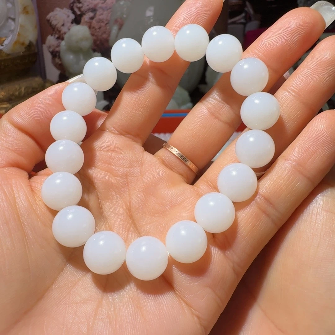 纪***博和田玉未镶嵌把件