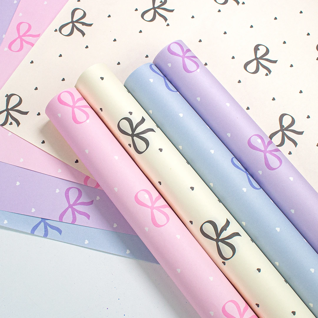 H H 蝴蝶结系列爱心波点10张可爱糖果色鲜花花束包装纸