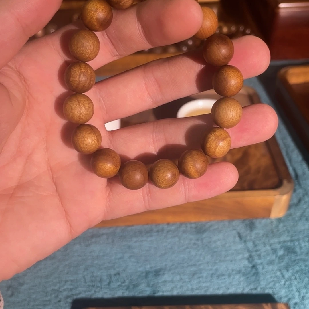 十字绣金丝楠木手串嘛