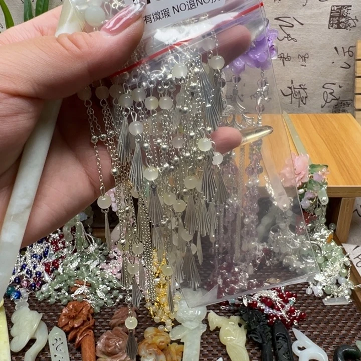 朱****合金蛇纹石玉发饰