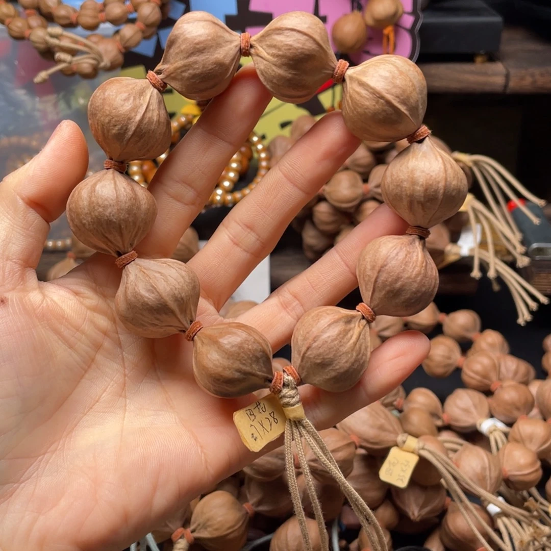 顽***主吊坠橄榄核2728四花铁核