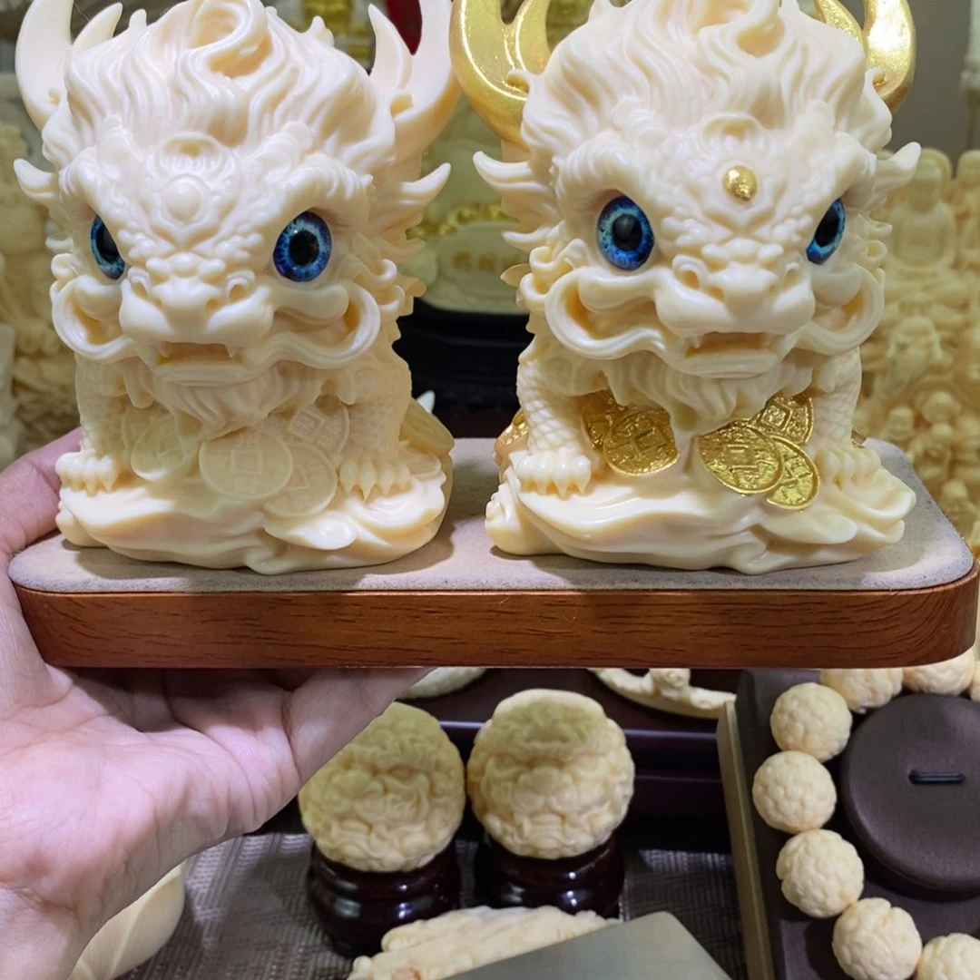 菩提根/象牙果把件象牙果大号麒麟一对