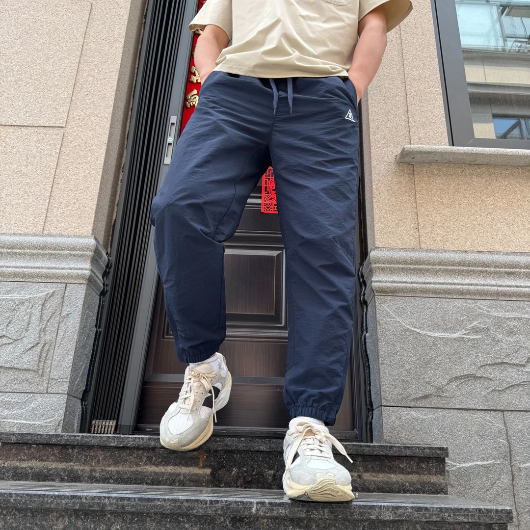 意大利轻奢！网格锦纶面料 三角裆拉链口袋户外宽松速干拉链束脚裤