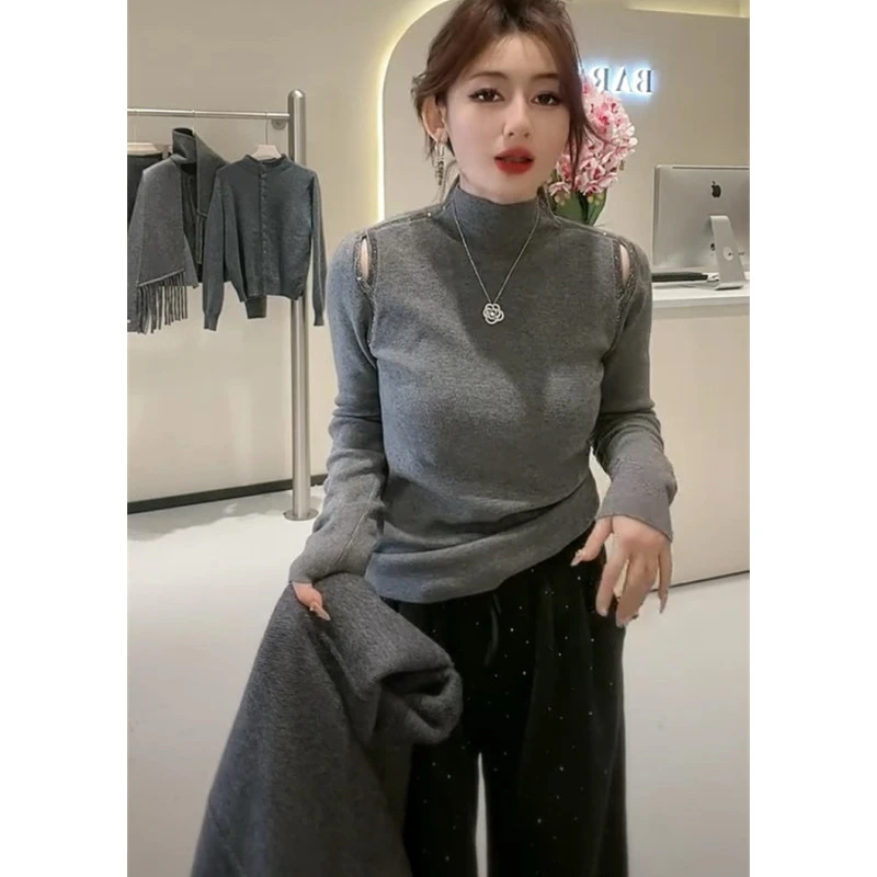 秋冬款性感镂空针织衫长袖女气质半高领修身毛衣打底衫设计感上衣