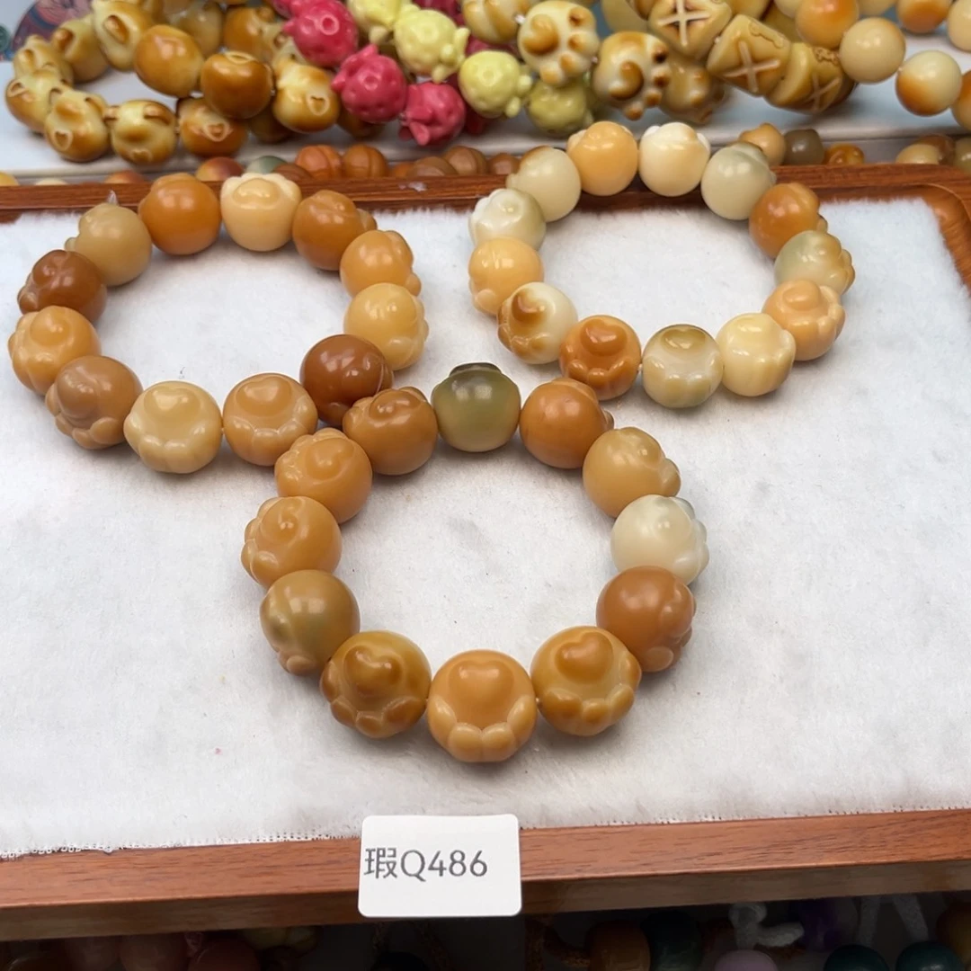 菩提根/象牙果手串瑕q486爱心猫爪随机一串20mm