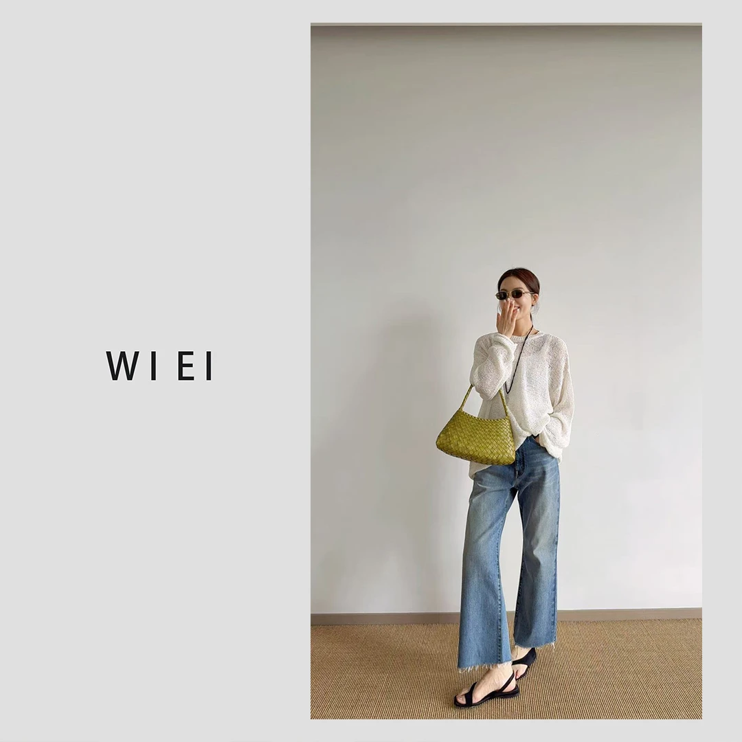 《WI EI》毛边牛仔*進口KAIHARA 显瘦微喇九分裤W25203006