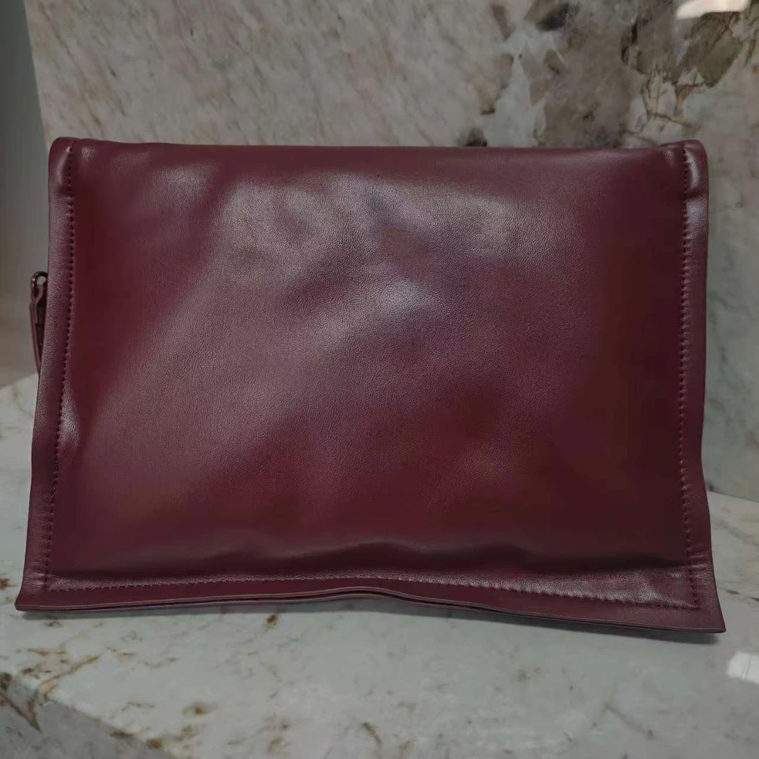 YNPO24年秋冬新款真皮重工女包叉软绵绵棉花红色