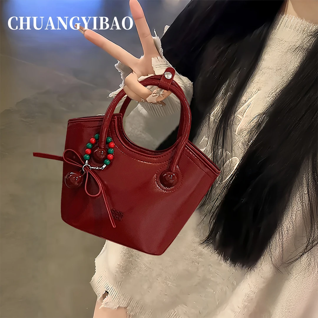 质感樱桃热恋手提托特包包女式2025设计师款同款气质单肩斜挎小包