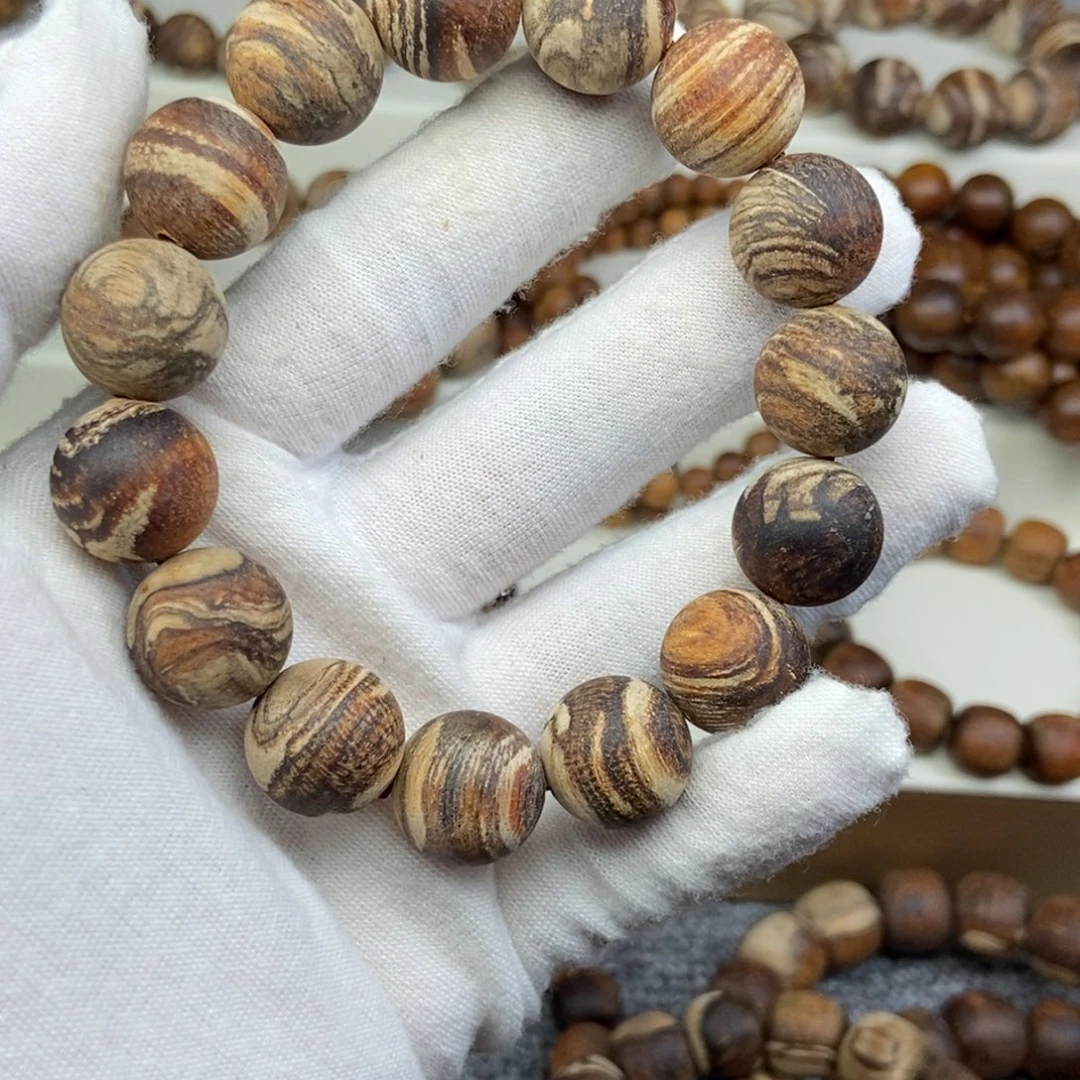 六***头贡木1.5妖花单圈手串