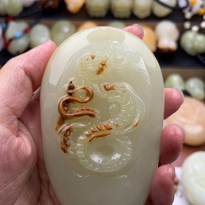 坤***哥石材古青石手把件