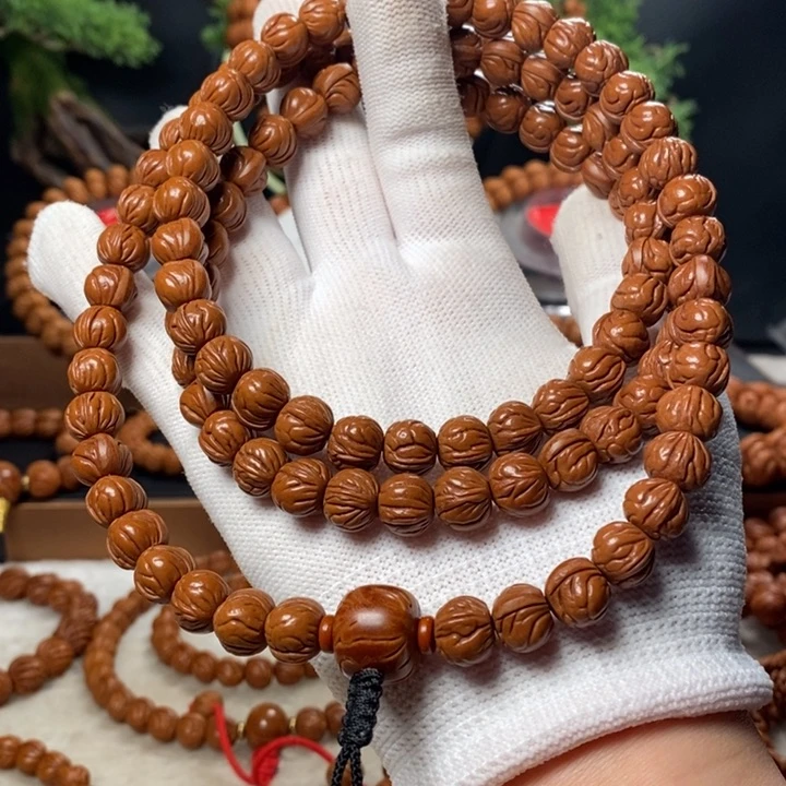 桃核吊坠这**好秦岭龙纹