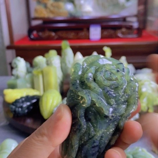 蛇纹石玉手把件未镶嵌心**约