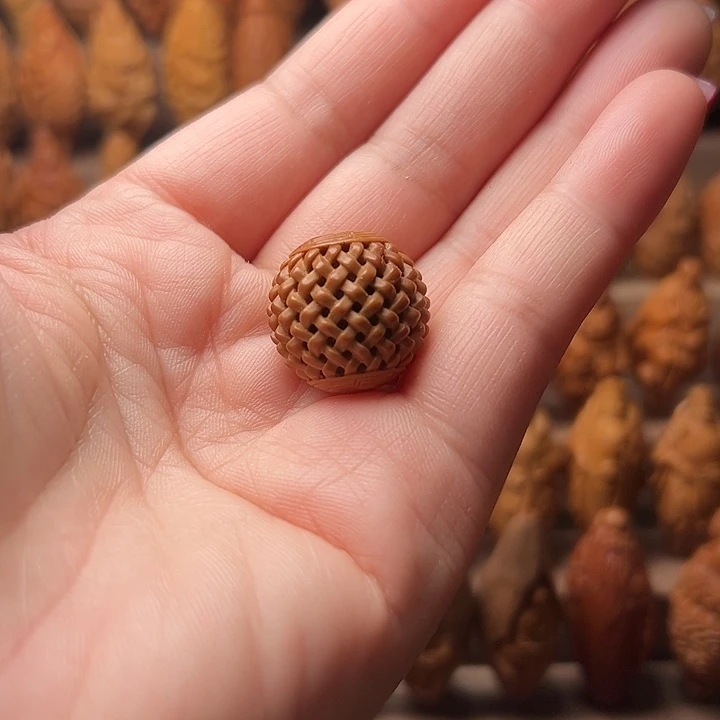 橄榄核吊坠文**蜡橄榄核