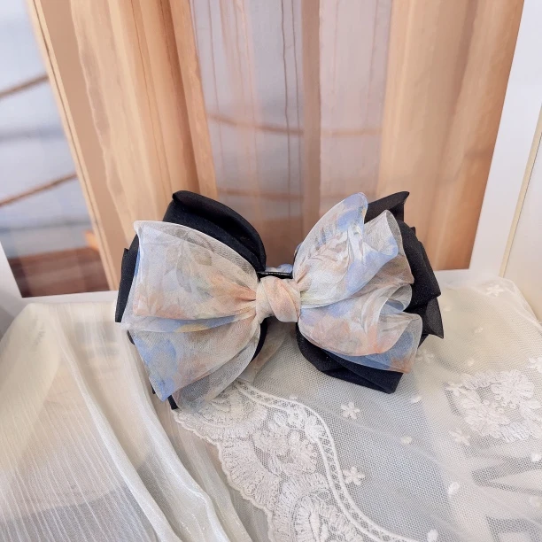 W807韩系简约气质清纯甜美欧根纱蝴蝶结香蕉夹