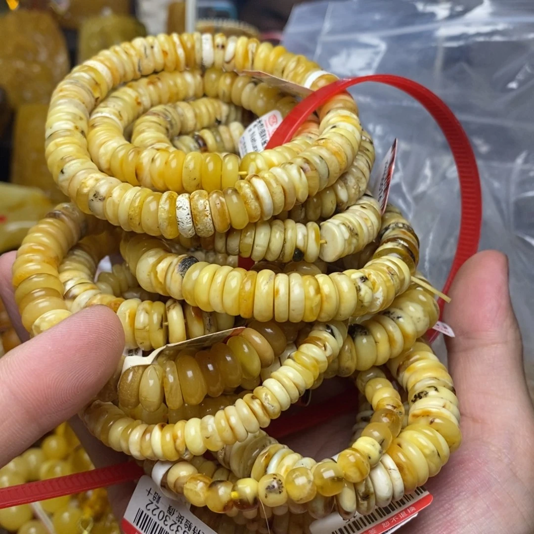 葫***张未镶嵌琥珀珠宝奇石