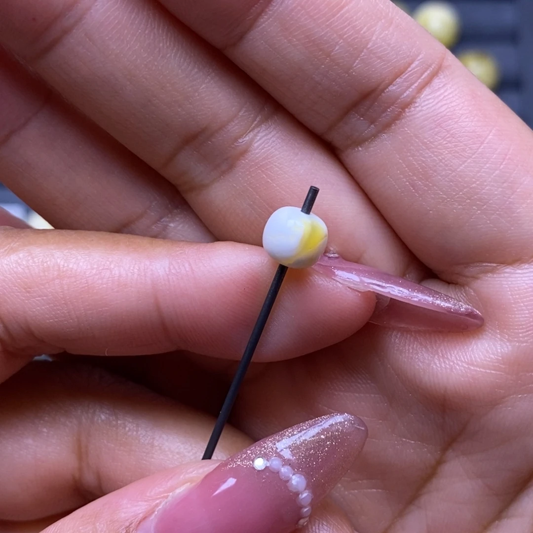 植物珀未镶嵌珠宝奇石瓷白橘金溶洞妖花老型7.2*6.2mm