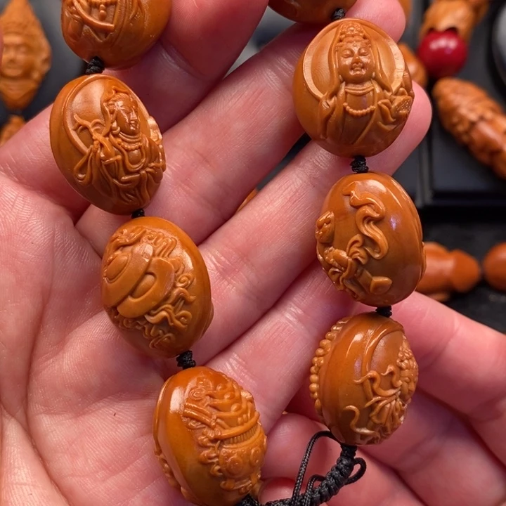 橄榄核手串八宝观音