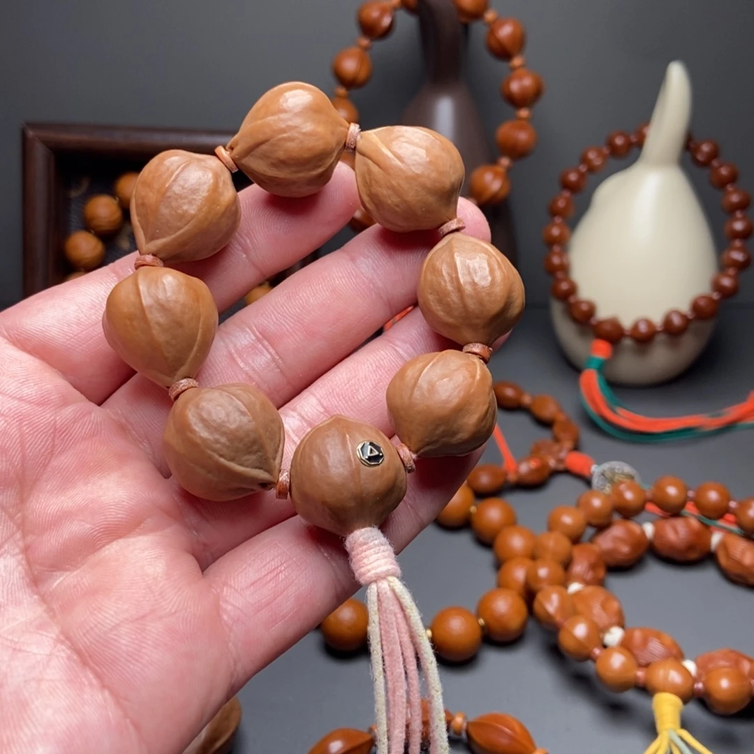 手串/手链橄榄核7颗 20-25油核手捻  苏工 橄榄核手串