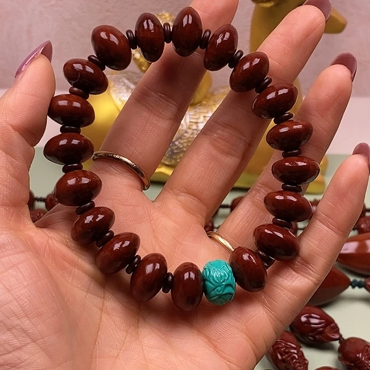 曹***哥橄榄核吊坠橄榄核手串