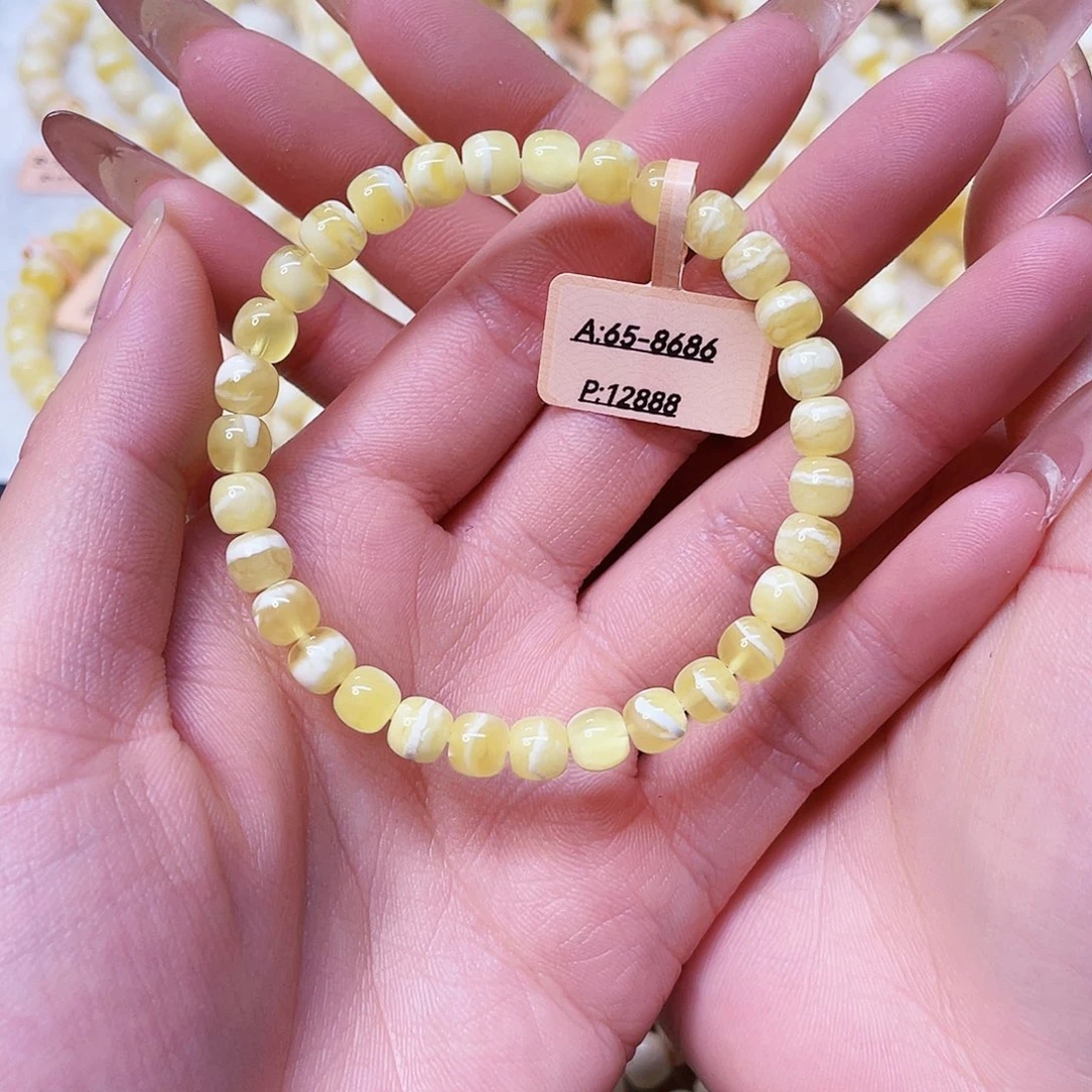 蜜蜡未镶嵌手链6.5mm橘底瓷白拉丝溶洞妖花