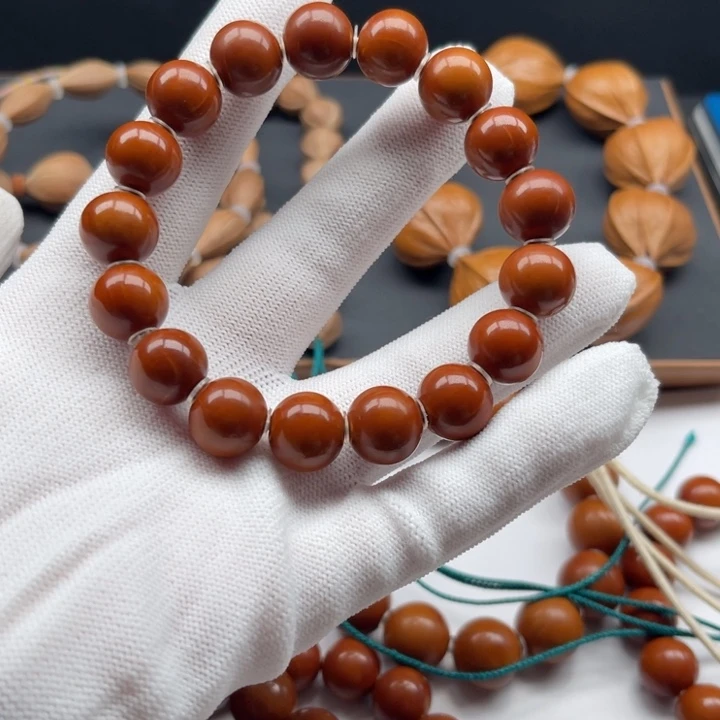 1.25尺寸百年老树橄榄铁核正圆光珠无补无漏