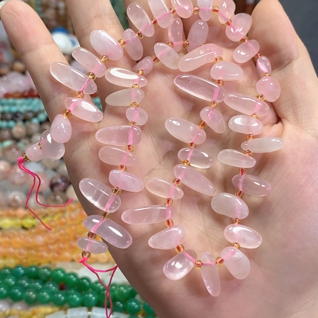 未镶嵌玛瑙/玉髓珠宝半成品粉晶长牙一条
