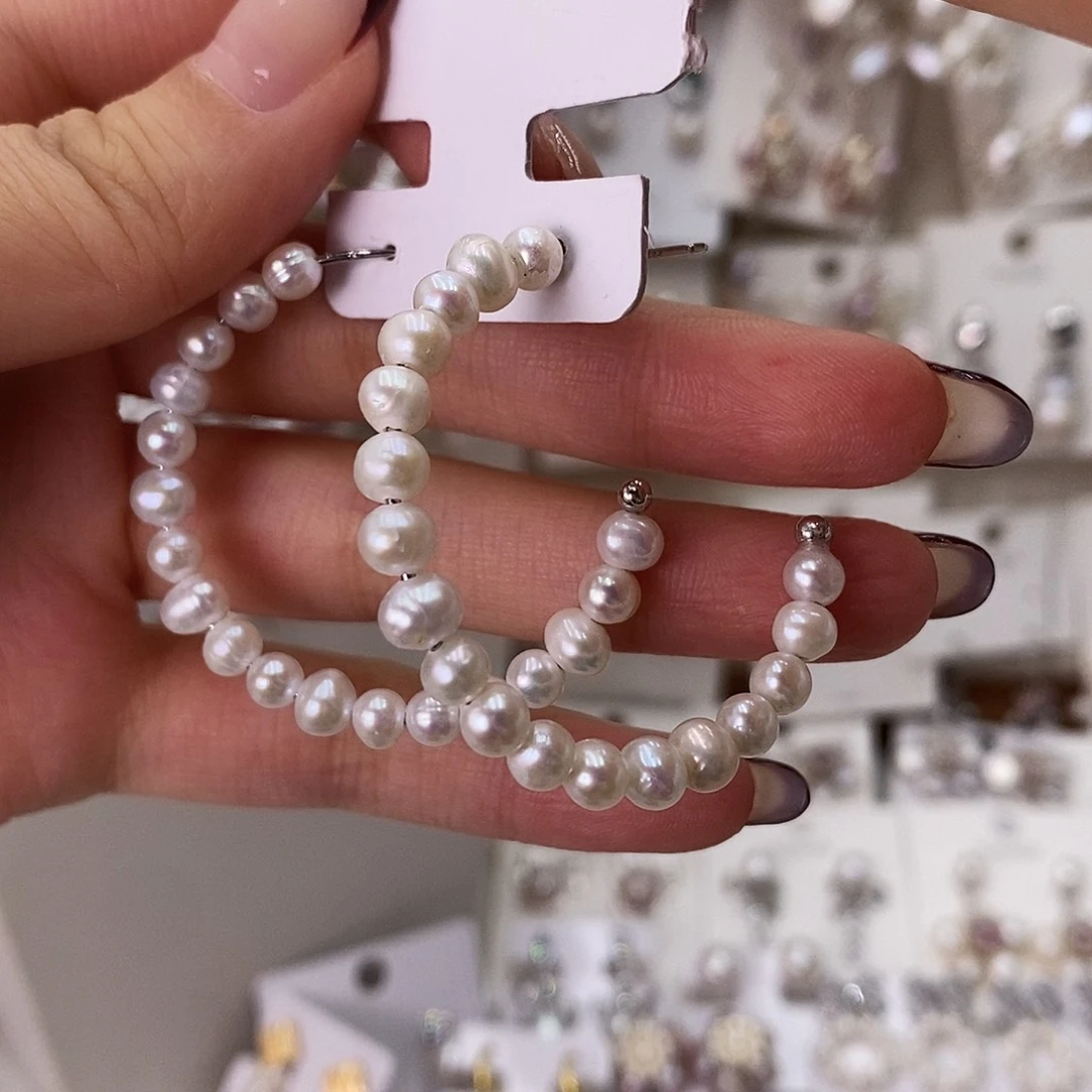 古***姐耳饰银S925镶嵌淡水珍珠