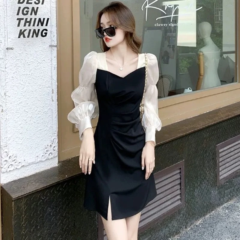 628 气质长袖短款开叉珠光袖子拼接连衣裙