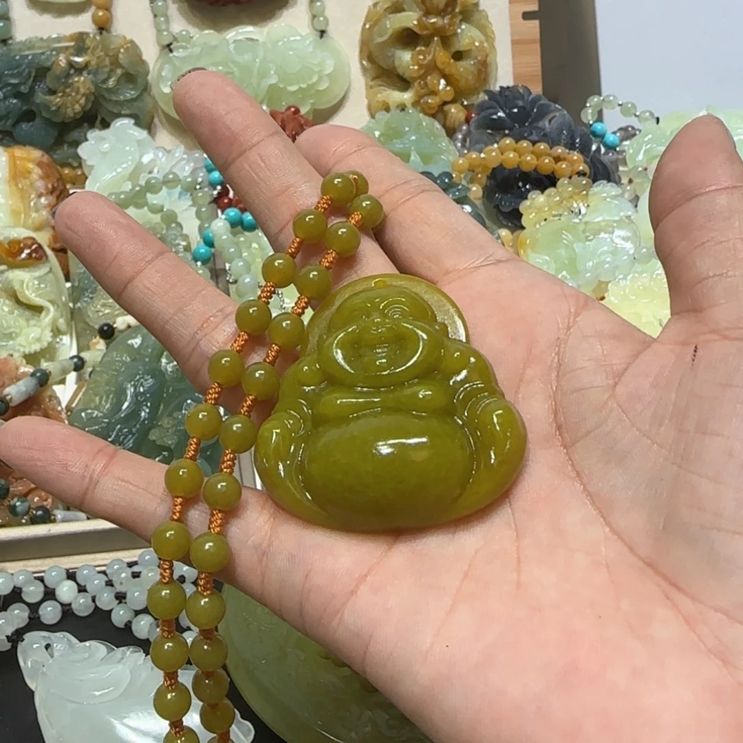 未镶嵌蛇纹石玉手把岁**魚