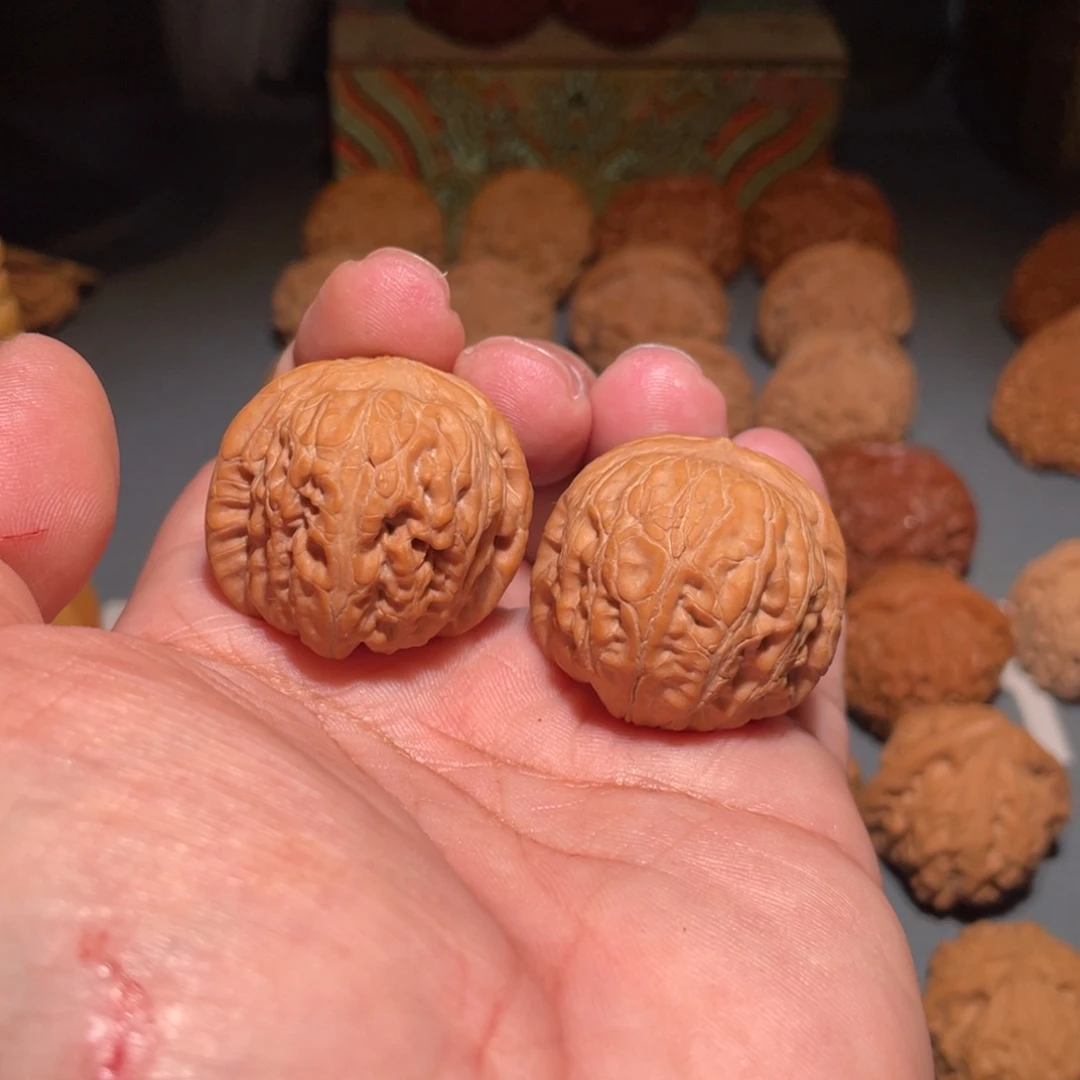 J***E吊坠桃核平谷元宝