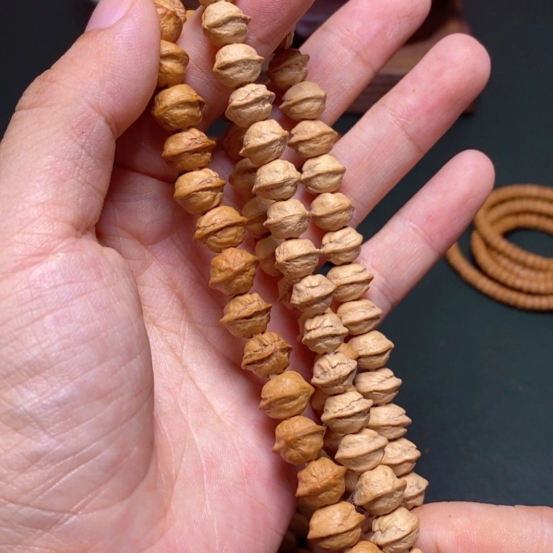 柏香籽/百香籽吊坠贝壳手持