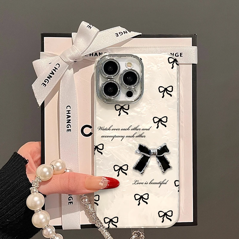 网红蝴蝶结手机壳适用于苹果15/14简约流行12/11个性贝壳纹13/16