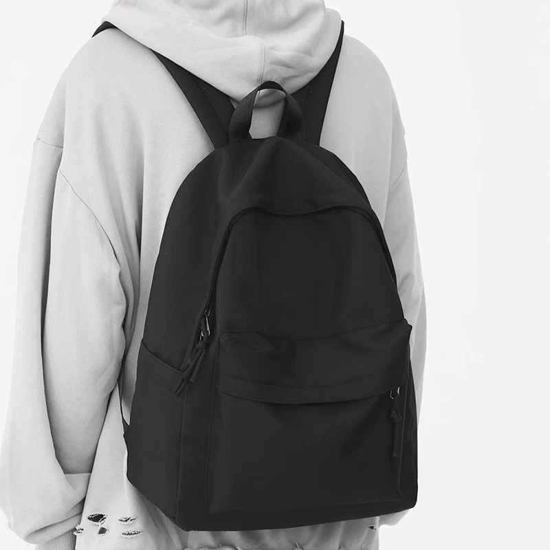 书包男黑色双肩包简约男士轻便大学生初中高中生男生小背包女肩包