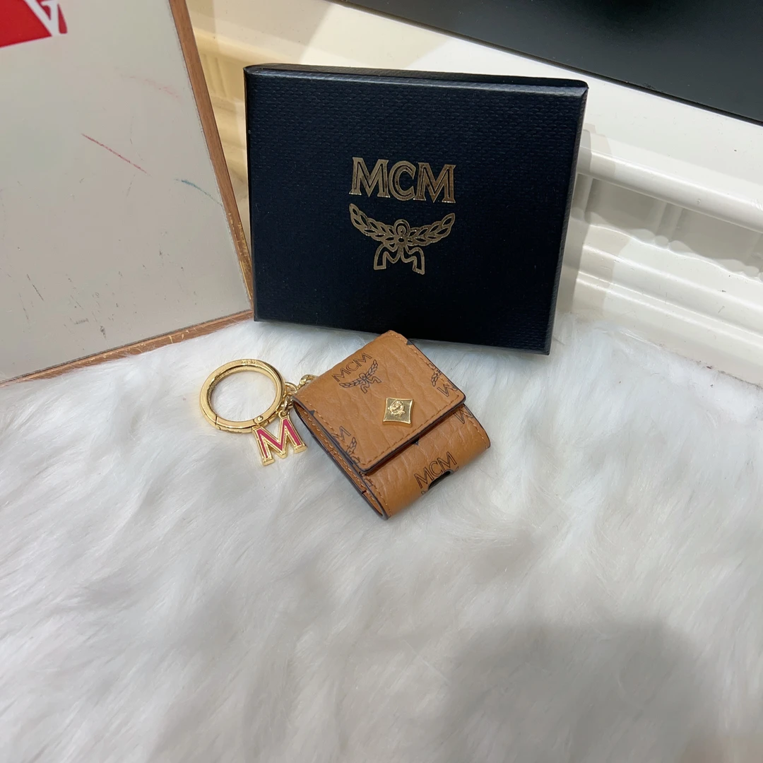 95新 MCM mcm耳机包 cj3698