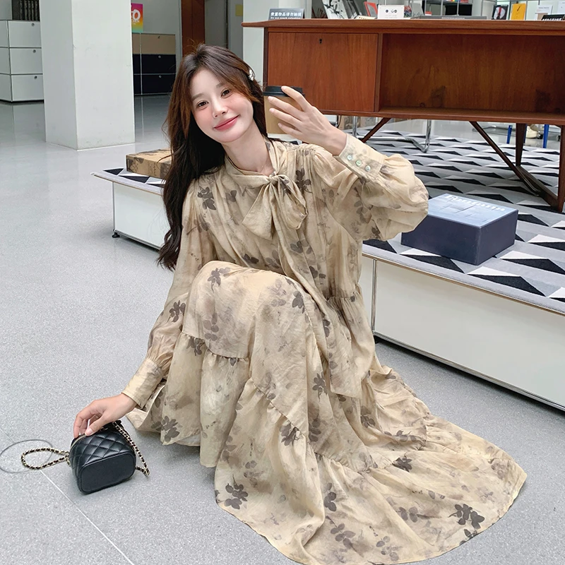 法式晕染茶歇碎花连衣裙女2025春新款设计感小众气质飘带优雅长裙