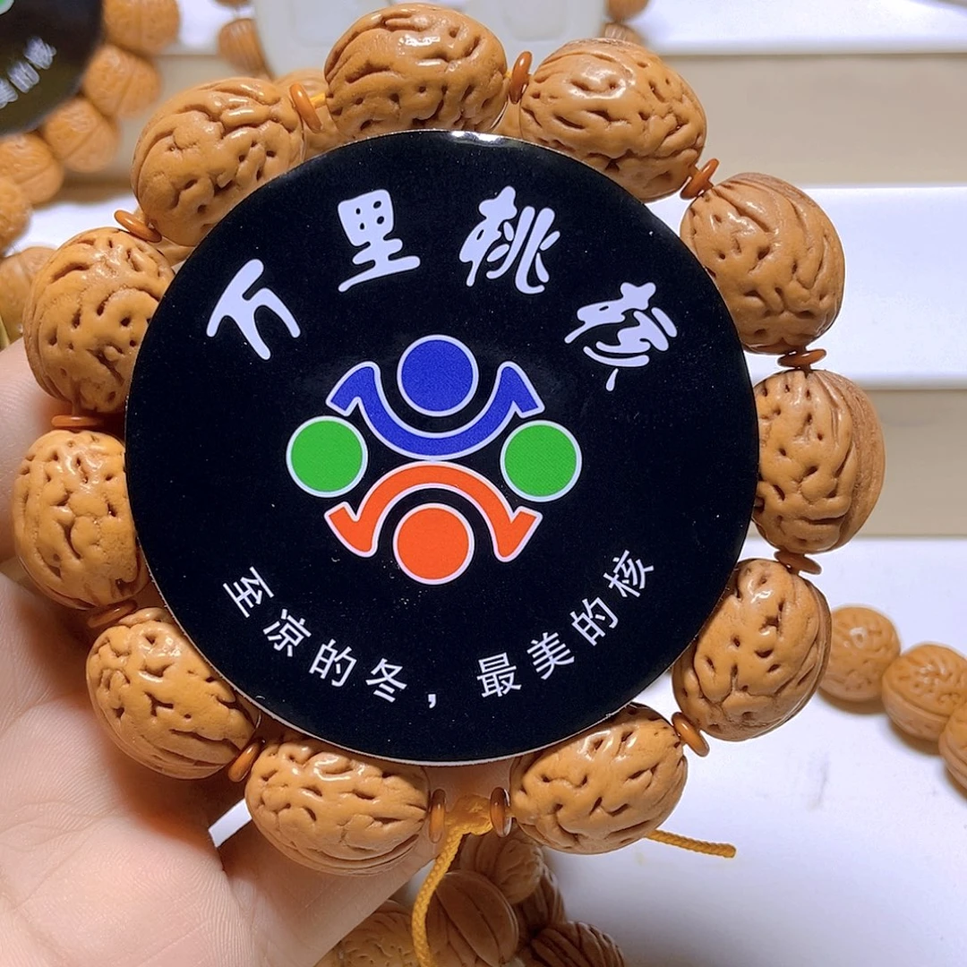 Y***G吊坠桃核肌肉钱袋子