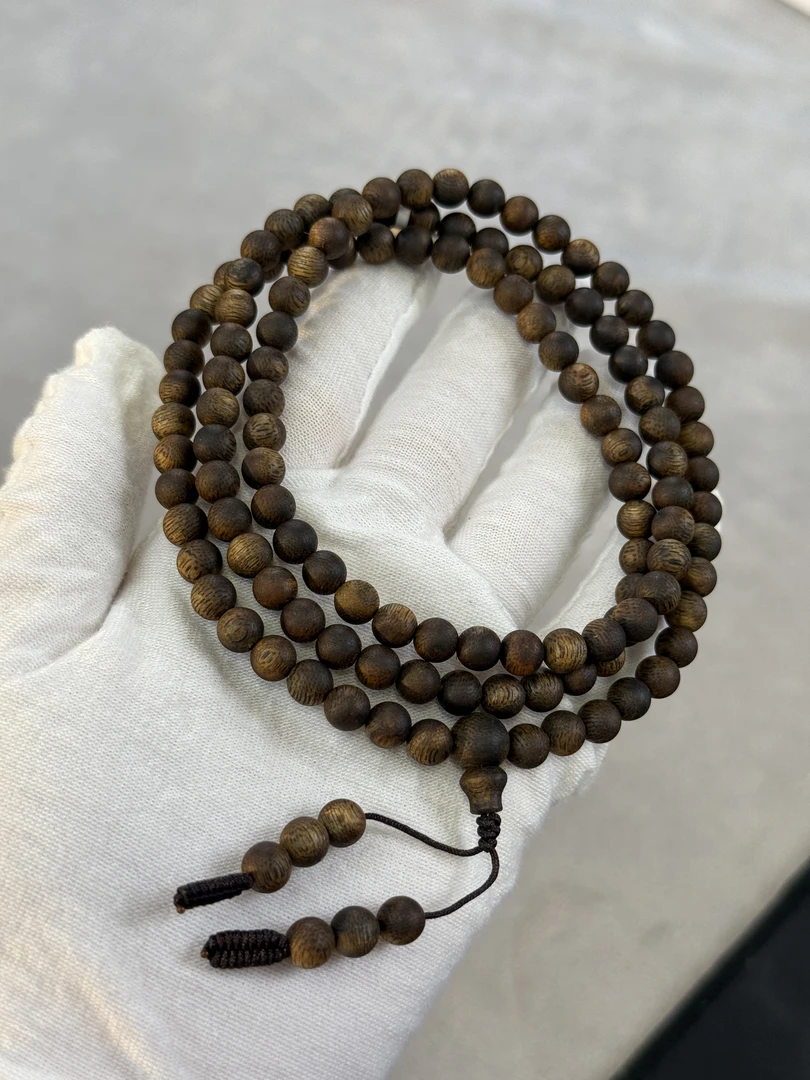 沉香老杨珍藏香（5A级）0.6紫棋高标圆珠多圈发一条