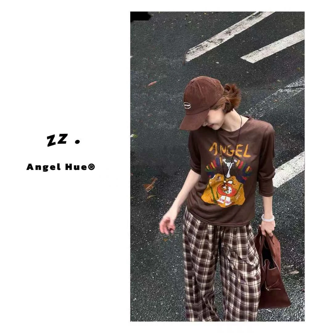 zz · 美式个性韩版卡通时尚印花长袖T恤女小众显瘦上衣727