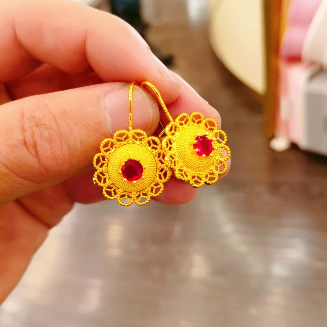 铜合金耳饰   پائالىيەت كۆزلۈك ھالقا 民族风耳环金色