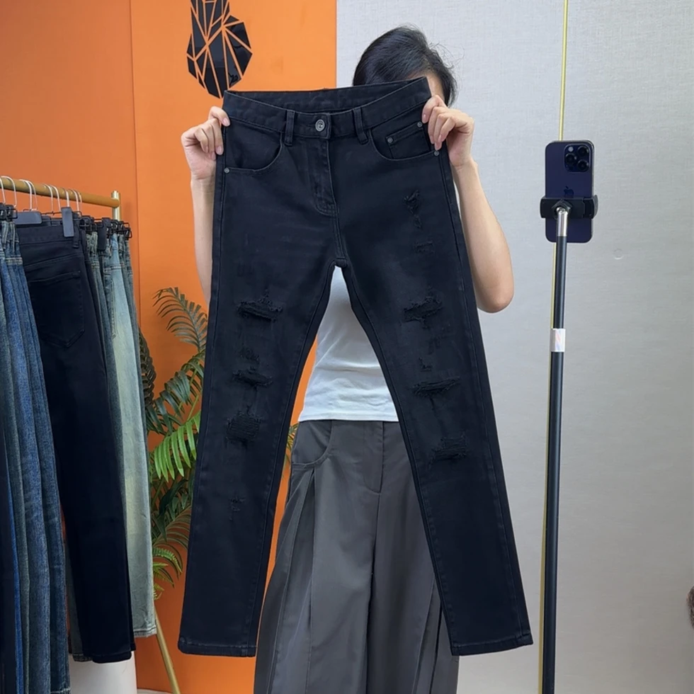 秋冬季潮流个性补丁假破洞黑色牛仔裤修身小直筒中腰休闲九分长裤