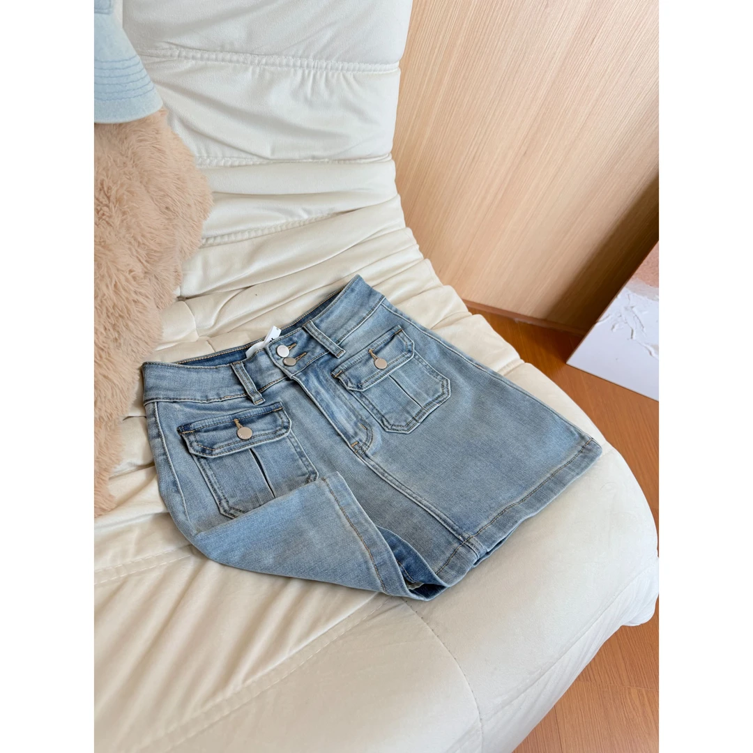 QiQi【名媛下午茶】夏季高级设计感牛仔三四分短裙高级双口袋-9866