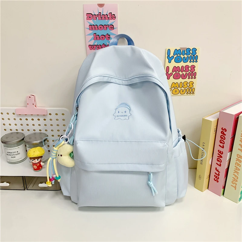 新款双肩背包夏季纯色简约时尚潮流初中生书包多色可选休闲双肩包