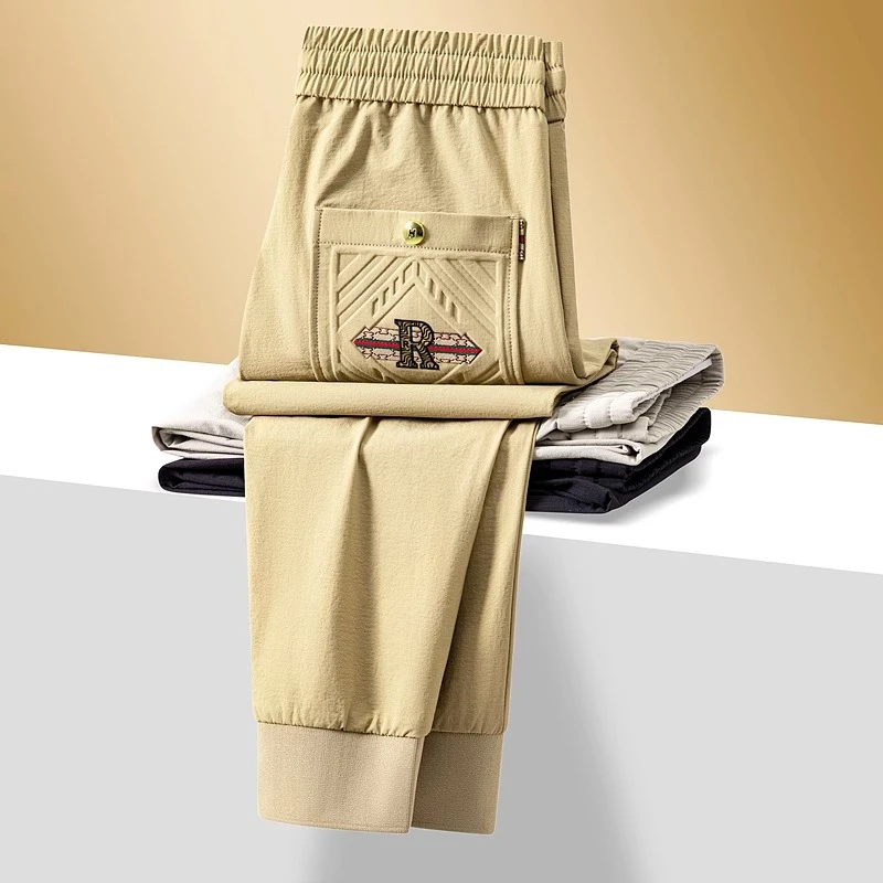 夏季薄款冰丝裤子男卡其色男士束脚裤2025新款高级字母直筒休闲裤