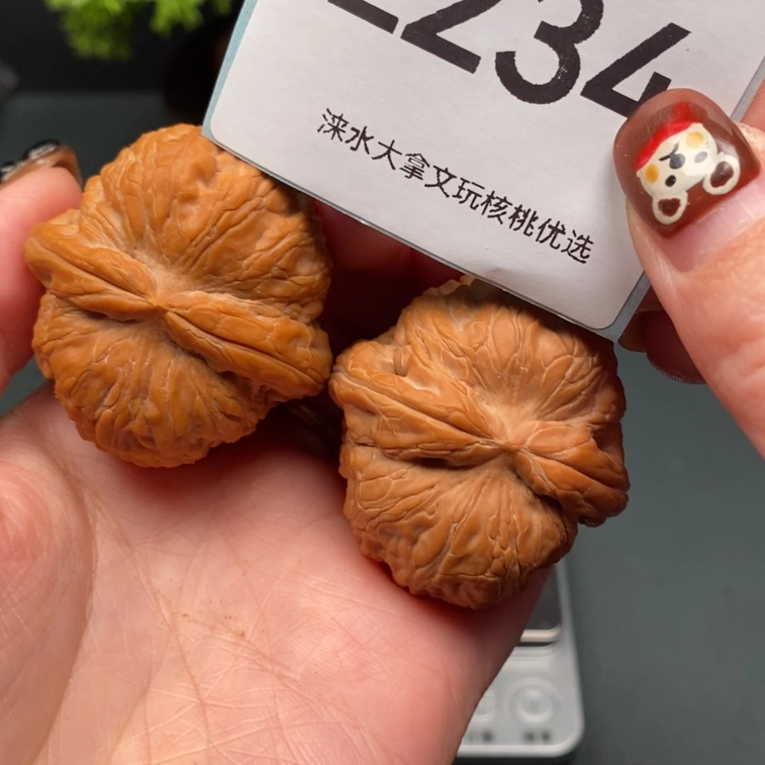 黄***马文玩核桃把件500        234