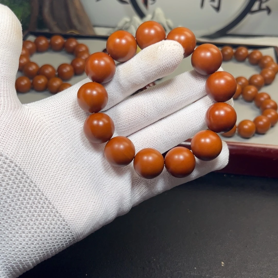船***痕橄榄核吊坠1.72树王铁核精品