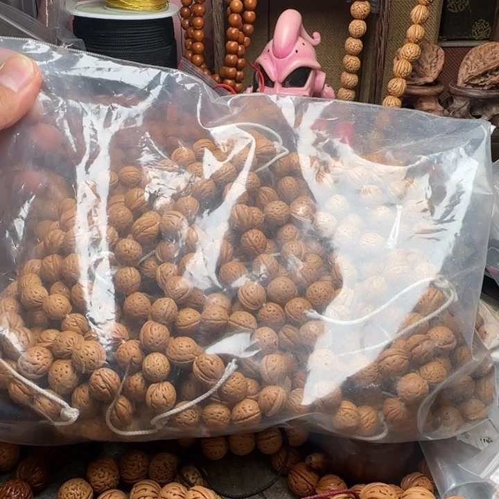 8号野生桃核金豆手持一条