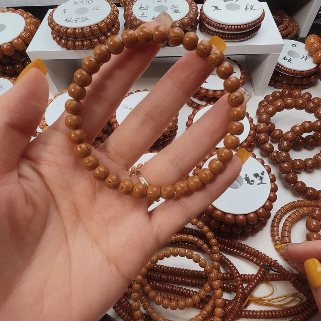 张***？桃核手串桃核光珠