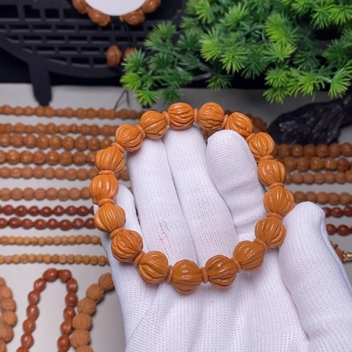 @***e手串桃核佛手通天纹